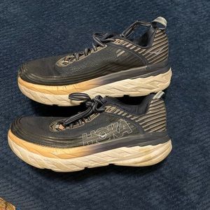 Hoka One One size 10.5 women’s. Blue, white and pink.